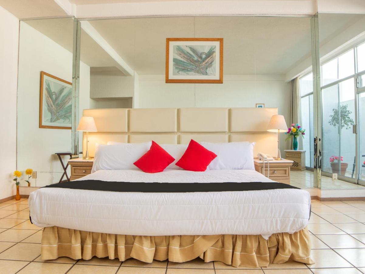 Capital O Hotel Villa Monini Puebla Extérieur photo
