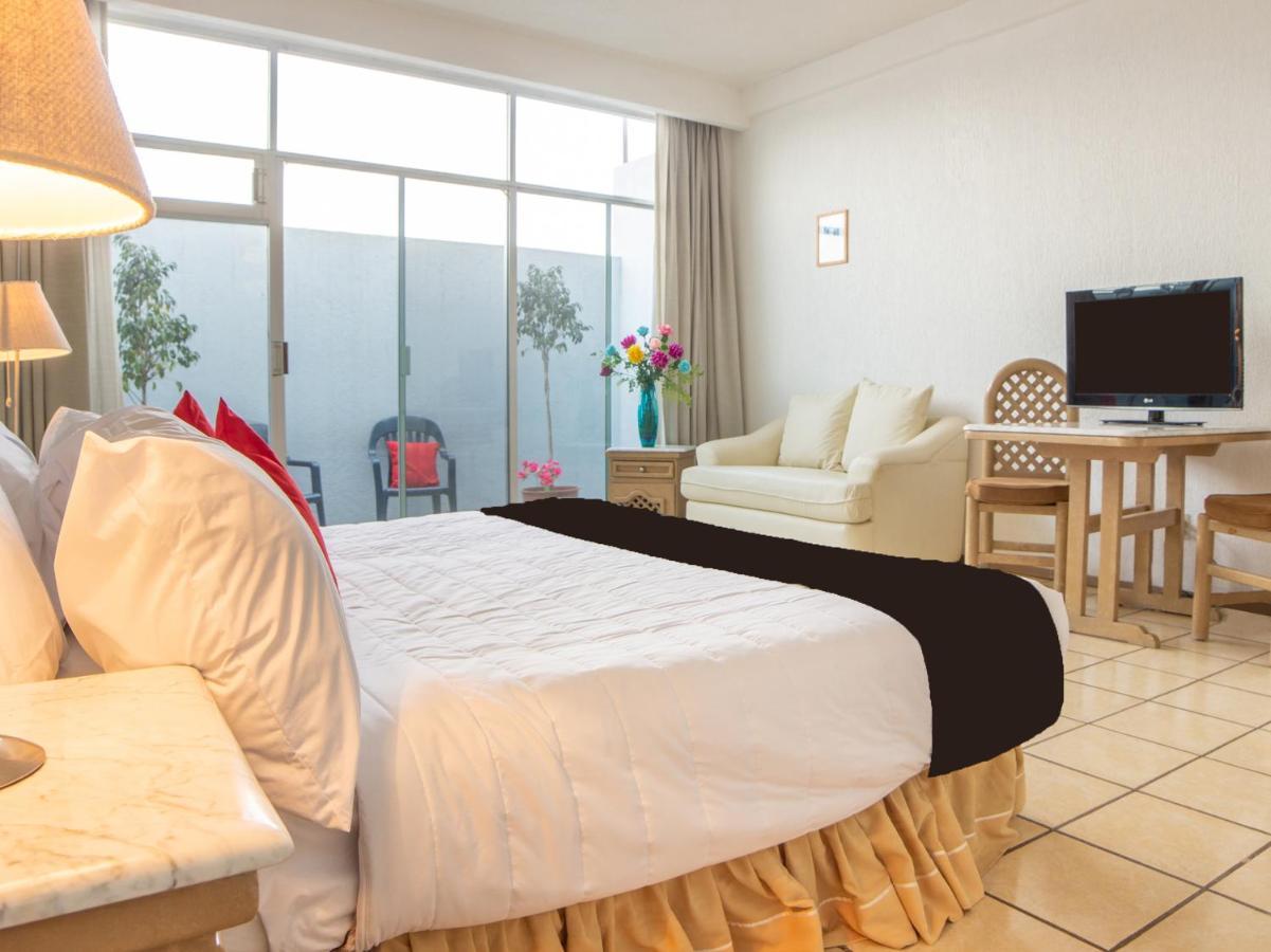 Capital O Hotel Villa Monini Puebla Extérieur photo