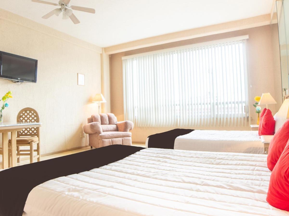 Capital O Hotel Villa Monini Puebla Extérieur photo