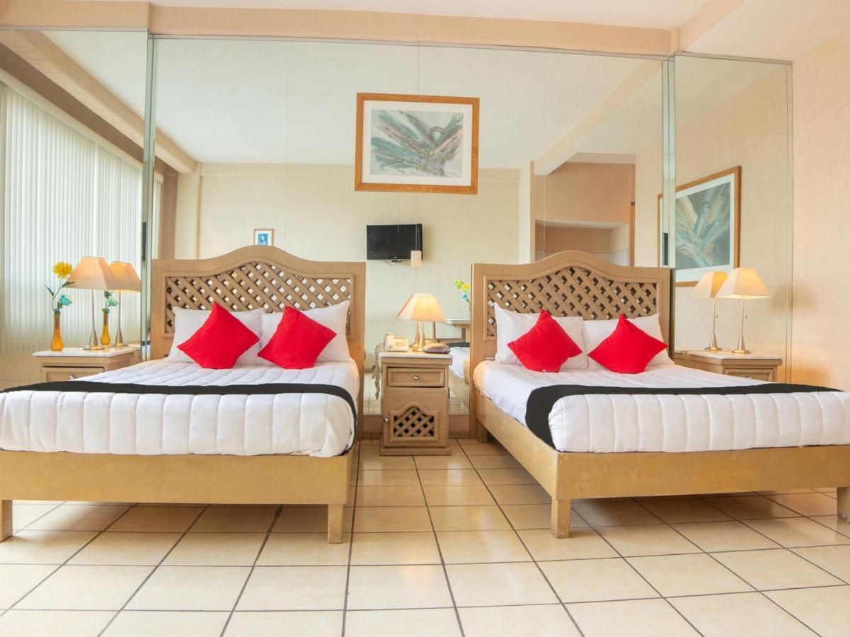 Capital O Hotel Villa Monini Puebla Extérieur photo