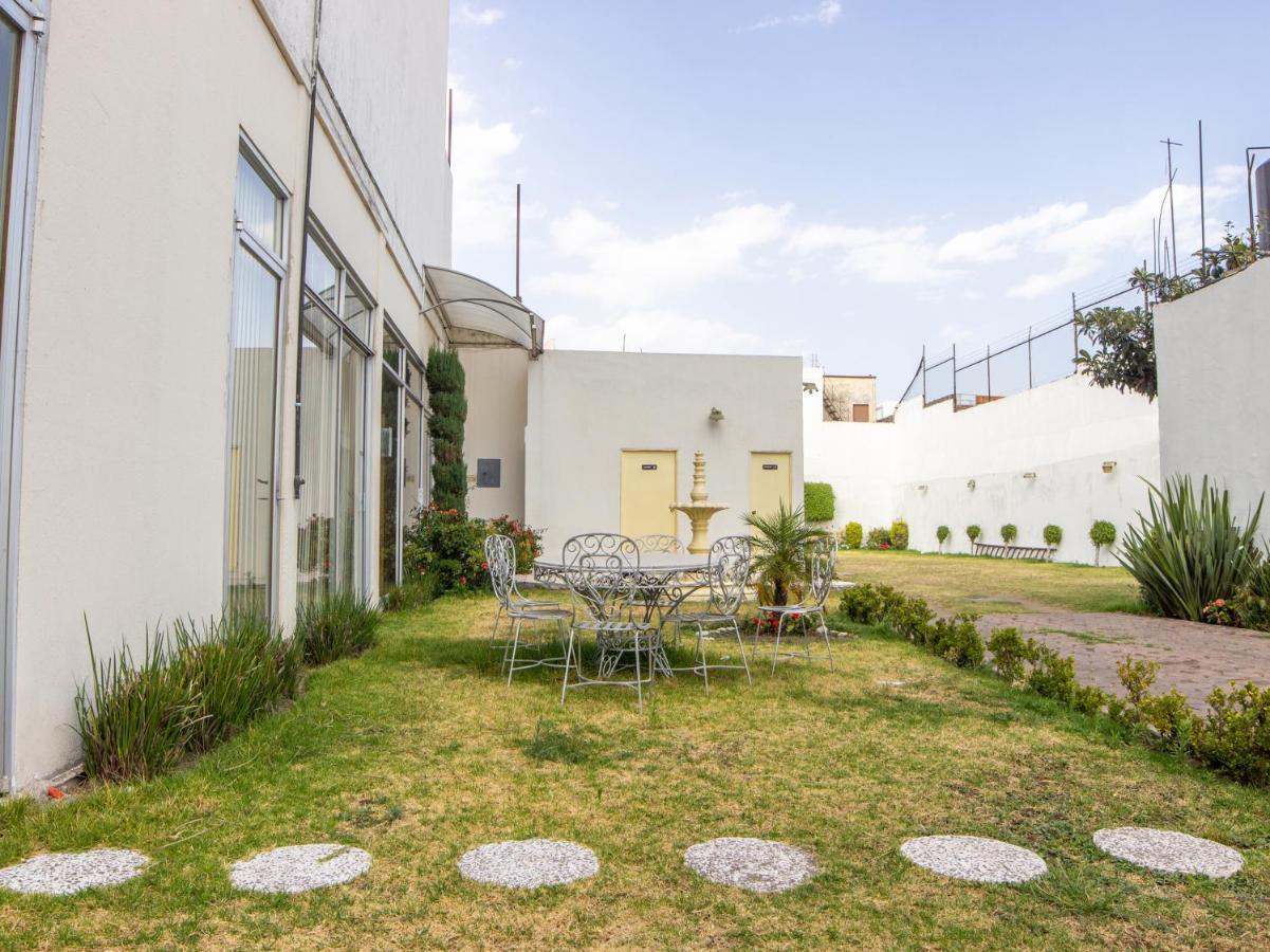 Capital O Hotel Villa Monini Puebla Extérieur photo